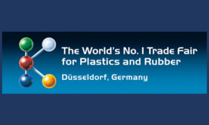 A blue banner with two balls and the words " the world 's no. 1 track for plastics and rubber ".